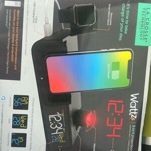 iPhone watch phone earbuds charger stand organiser alarm lacrosse technology